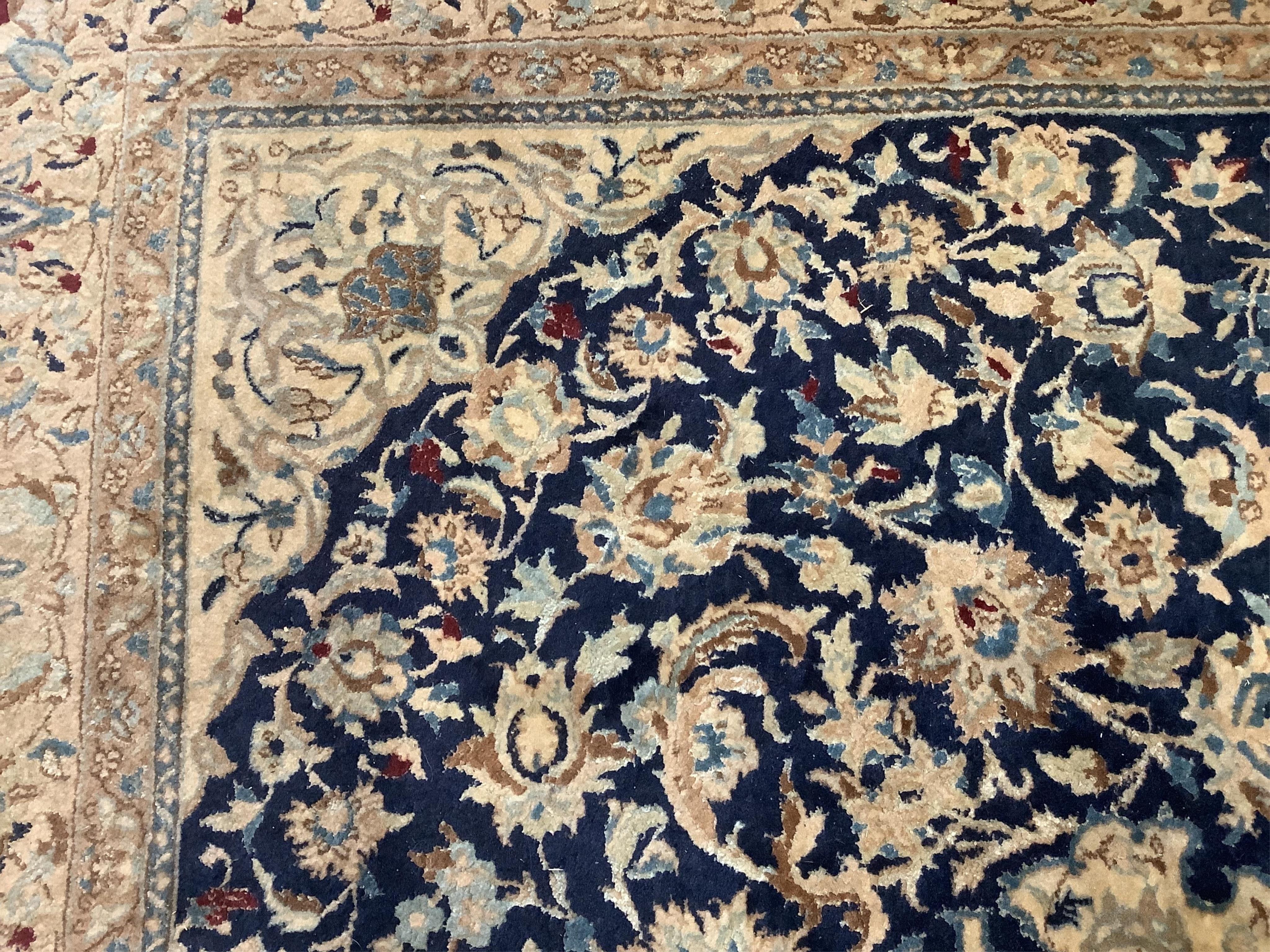 A Nain blue ground carpet, 277 x 174cm. Condition - fair to good